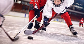 People playing hockey